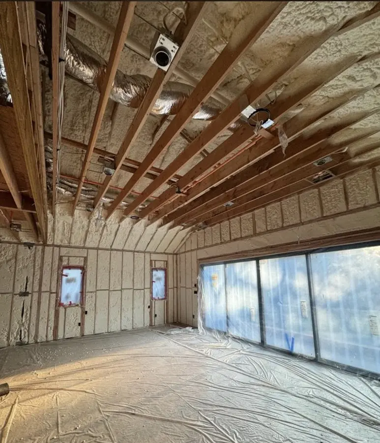 Interior walls and ceiling insulated with spray foam during new construction in Rantoul